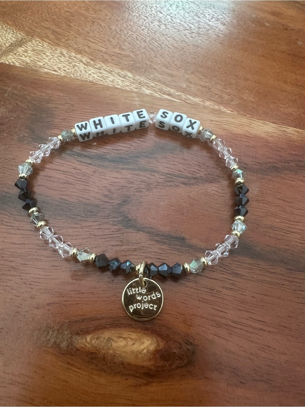 White and Black Beaded‎ Bracelet with Gold Charm